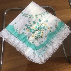 Linen Handkerchief with Lace Trim. The Flowers are printed. 14” square.
